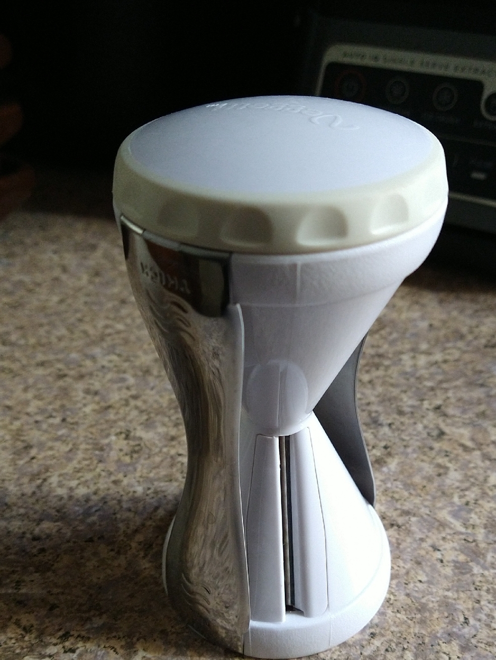 White and Chrome Handheld Spiral Vegetable Peeler